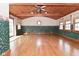 Large living room with wood floors, wood ceiling, and lots of windows at 218 Demarest Dr, Indianapolis, IN 46214