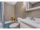 Cozy bathroom featuring a single sink vanity, toilet, and tub with a patterned shower curtain at 2353 Woodcreek Crossing Blvd, Avon, IN 46123