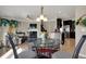 Inviting dining area transitions to a living room and kitchen, great for entertaining at 2627 Congress St, Carmel, IN 46032