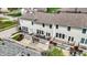 Attractive townhomes with private garages, balconies, and a peaceful street view at 2627 Congress St, Carmel, IN 46032