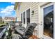 Cozy patio with outdoor seating, planters, and lovely views of the surrounding neighborhood at 2627 Congress St, Carmel, IN 46032