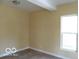 Bedroom with natural light streaming through the window at 2811 S Elm St, Muncie, IN 47302