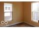 Bedroom featuring natural light from two windows and neutral walls at 2811 S Elm St, Muncie, IN 47302