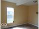 A bedroom featuring a window that allows natural light and provides an outside view at 2811 S Elm St, Muncie, IN 47302