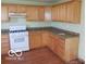 Kitchen with light cabinets, and a gas range at 2811 S Elm St, Muncie, IN 47302