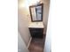 Bathroom vanity features white marble top, dark wood cabinets and modern fixtures at 2862 Punto Alto Ct, Indianapolis, IN 46227