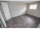 Bedroom includes vinyl flooring, a window and a neutral color palette at 2862 Punto Alto Ct, Indianapolis, IN 46227