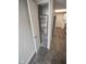 HVAC unit inside closet off the kitchen on updated gray vinyl plank flooring at 2862 Punto Alto Ct, Indianapolis, IN 46227