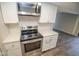 Bright kitchen featuring white cabinets, stainless steel appliances, and modern countertops at 2862 Punto Alto Ct, Indianapolis, IN 46227