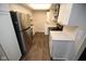 Modern kitchen featuring stainless steel appliances, stylish white cabinets, and sleek countertops at 2862 Punto Alto Ct, Indianapolis, IN 46227