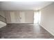 Spacious living room features neutral walls, stairs and modern gray flooring at 2862 Punto Alto Ct, Indianapolis, IN 46227