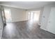 Large living room with neutral walls, gray flooring and doors to the exterior at 2862 Punto Alto Ct, Indianapolis, IN 46227