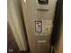 Close up of an automatic storage water heater with warnings and safety guidelines at 2862 Punto Alto Ct, Indianapolis, IN 46227