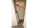 Hot water heater located in the utility closet with updated vinyl plank flooring at 2862 Punto Alto Ct, Indianapolis, IN 46227