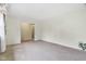 Spacious living room with neutral carpet and ample natural light at 2910 S Sheridan Ave, Indianapolis, IN 46203