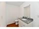 Bathroom showcasing a white vanity with granite countertop and modern fixtures at 3015 E Sumner Ave, Indianapolis, IN 46237