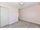 This bedroom features neutral walls, carpeted floors, and a closet at 3015 E Sumner Ave, Indianapolis, IN 46237