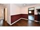 Bright dining room with wood-look floors offers an open floor plan at 3015 E Sumner Ave, Indianapolis, IN 46237