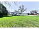 Charming single-story home with a well-manicured lawn and an attached two car garage at 3015 E Sumner Ave, Indianapolis, IN 46237