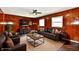 Comfortable living room with wood paneling, tv, and rustic accents at 3015 E Sumner Ave, Indianapolis, IN 46237