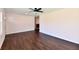 Open living room area featuring wood-look flooring, neutral walls and great natural light at 3015 E Sumner Ave, Indianapolis, IN 46237