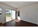 Sunroom with wood-look floors and outdoor access, perfect for relaxing and enjoying natural light at 3015 E Sumner Ave, Indianapolis, IN 46237