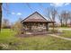 Cozy home with flowers and a large yard at 3070 N Layman Ave, Indianapolis, IN 46218