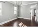 Living room featuring hardwood floors, grey walls and natural light at 317 E 37Th St, Indianapolis, IN 46205