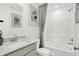 Bright, clean bathroom with a shower-tub combo, white tile, and modern fixtures at 3326 Wetherby Pl, Danville, IN 46122