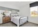 Cozy bedroom features a bed with white bedding, and a neutral color palette at 3326 Wetherby Pl, Danville, IN 46122