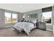 Serene bedroom with a large bed, neutral tones, and natural light from large windows at 3326 Wetherby Pl, Danville, IN 46122