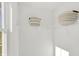 Bright walk-in closet with white wire shelving and decorative baskets at 3326 Wetherby Pl, Danville, IN 46122