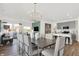 Open-concept dining room with views of the kitchen and living room at 3326 Wetherby Pl, Danville, IN 46122