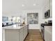 Bright kitchen with stainless steel appliances, center island, and open floor plan at 3326 Wetherby Pl, Danville, IN 46122