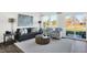 Cozy living room with comfortable seating and large windows, and stylish decor at 3326 Wetherby Pl, Danville, IN 46122