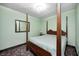 Cozy bedroom featuring a four poster bed and a carpet with a floral pattern at 345 E Main St, Jamestown, IN 46147