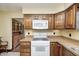 Kitchen with white stove and microwave, and lots of oak cabinets at 345 E Main St, Jamestown, IN 46147