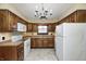 Spacious kitchen with white appliances and light wood cabinets at 345 E Main St, Jamestown, IN 46147