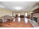 Spacious living room with hardwood floors, fireplace, and lots of natural light at 345 E Main St, Jamestown, IN 46147