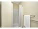 Bathroom with white shower, shower curtain, towel and stainless steel towel rack at 345 E Main St, Jamestown, IN 46147