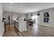Spacious kitchen with stainless steel appliances, granite countertops, and a large island at 3598 Planck Cir, Danville, IN 46122