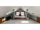 Charming attic nook with built-in seating and natural light creates a cozy spot at 4030 N Illinois St, Indianapolis, IN 46208