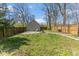 Private backyard features a detached garage and a patio area, perfect for outdoor entertaining at 4030 N Illinois St, Indianapolis, IN 46208