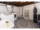 Basement laundry area with washer, dryer, and utility sink offers functionality at 4030 N Illinois St, Indianapolis, IN 46208