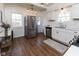 Bright kitchen with stainless steel appliances, white cabinets, and hardwood floors offers modern style at 4030 N Illinois St, Indianapolis, IN 46208