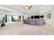 Finished basement with open floor plan, recessed lighting, bar seating and walkout to the back yard at 4196 Parliament Way, Avon, IN 46123