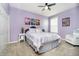 Cozy bedroom with a queen bed, soft carpet flooring, and natural light from the window at 4196 Parliament Way, Avon, IN 46123