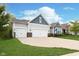 Charming two-story home featuring a two-car garage, light gray siding, and a well-manicured lawn at 4196 Parliament Way, Avon, IN 46123