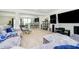 Inviting living room featuring comfortable seating, media center, and an open bar area for entertaining guests at 4196 Parliament Way, Avon, IN 46123