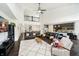 Spacious open living room featuring soaring ceilings, dark hardwood floors, and seamless flow at 4196 Parliament Way, Avon, IN 46123